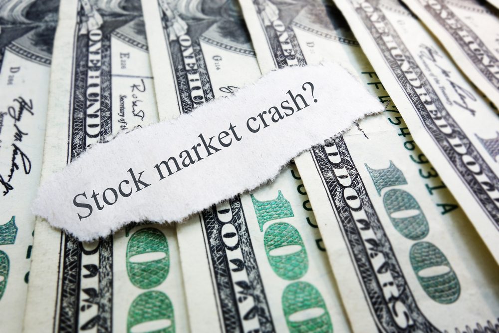 Stock,Market,Crash,Newspaper,Scrap,On,Assorted,Money